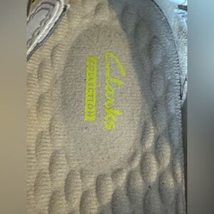 Clarks Footwear with Yellow Logo